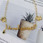 Load image into Gallery viewer, Custom Handmade Name Necklace with Butterfly, 14K Gold Filled Wire  - NovaHearts Jewelry
